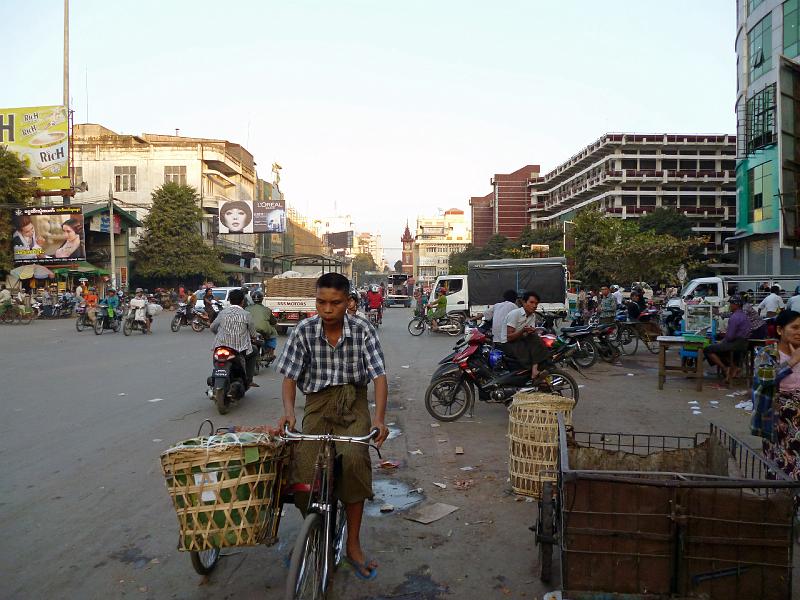 Burma III-052-Seib-2014.jpg - 26th Road in Mandalay; in the background the British Diamond Jubilee Clock Tower built in 1896 (Photo by Roland Seib)